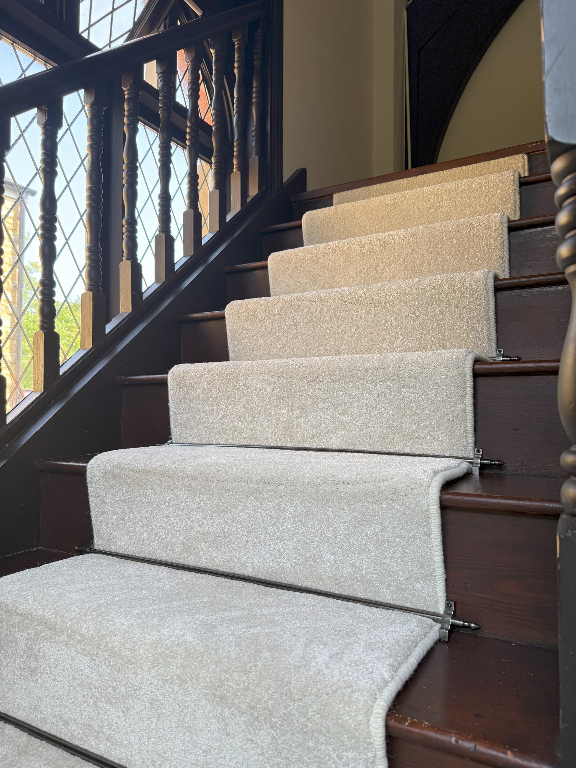 Stair rods on stair runner