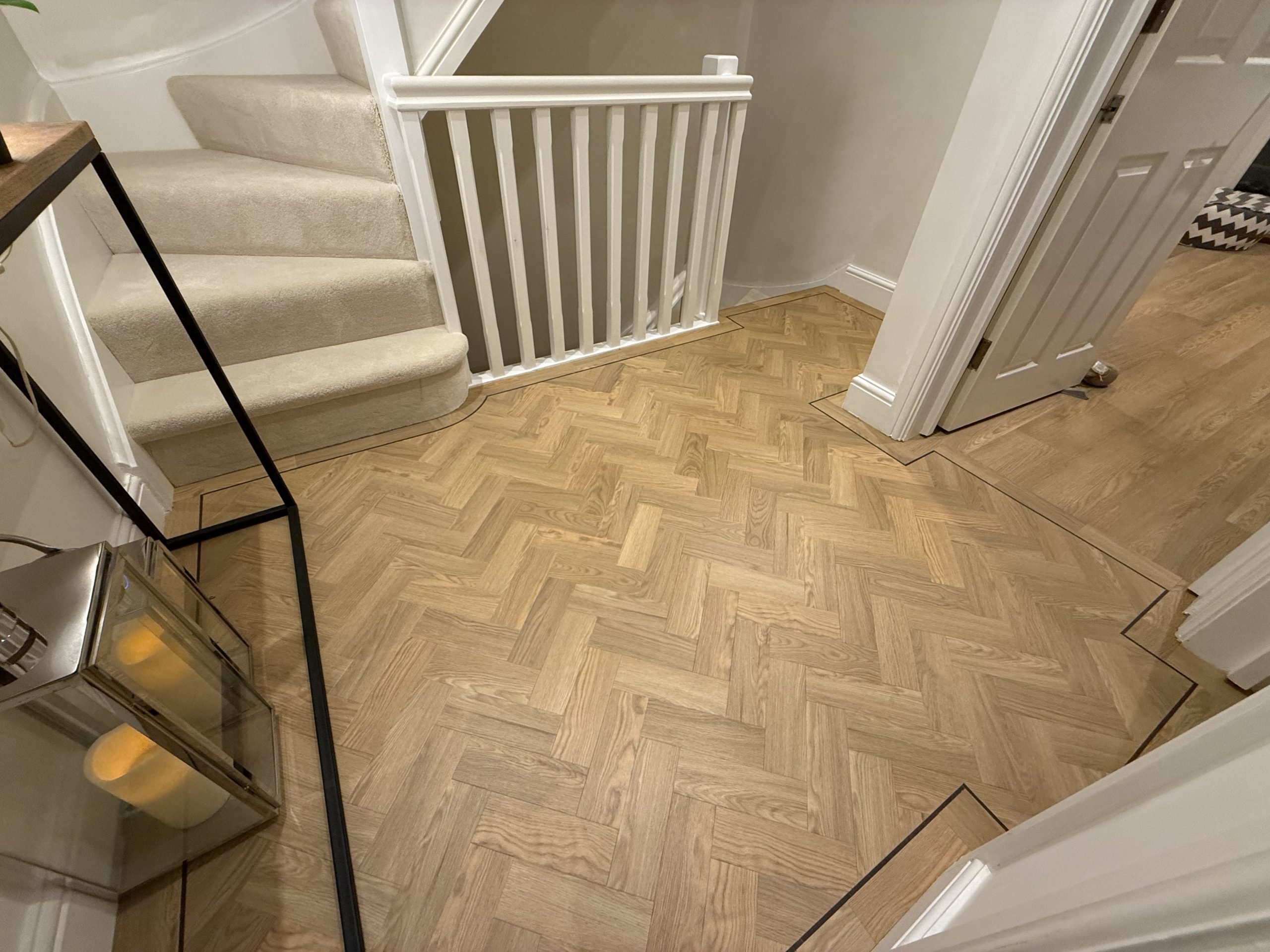 Amtico Spacia Pale Ash hallway parquet with dark walnut design strip